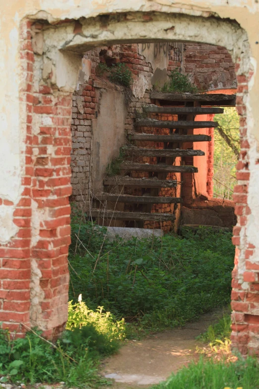 an open doorway with steps leading up into the inside