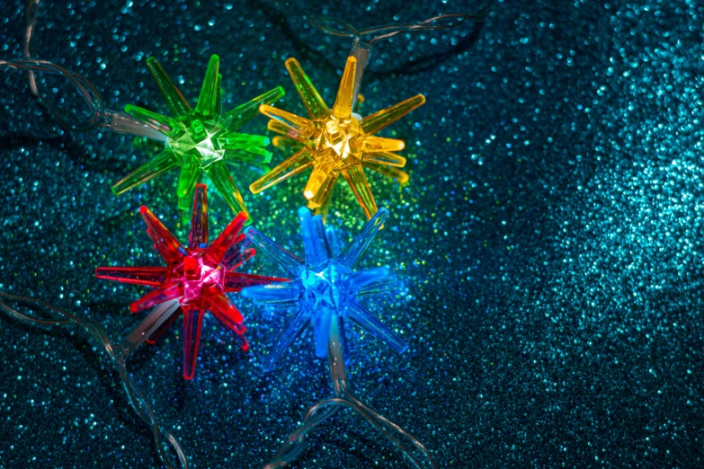 colorful lights that look like glass snow flakes