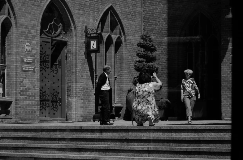 a man is walking down some stairs next to some stairs