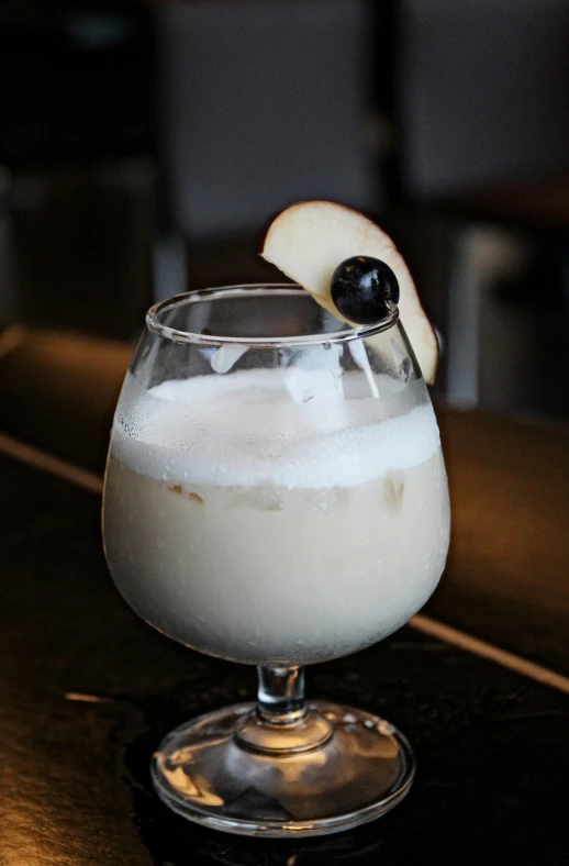 an image of an old fashioned dessert in a wine glass