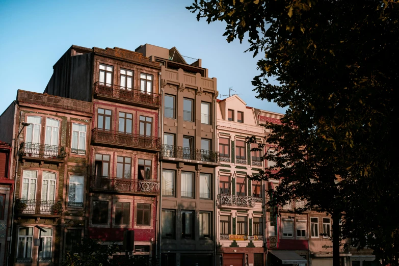 buildings in a row lined up on a city street