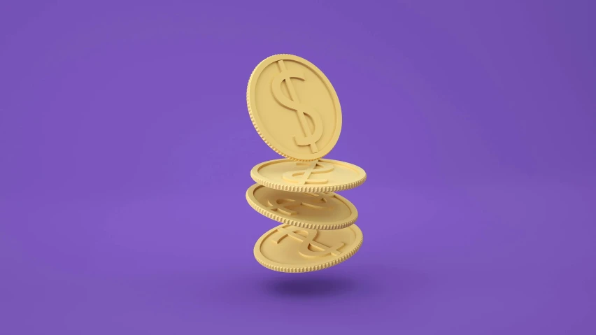 three dollar coins sit inside a golden ring