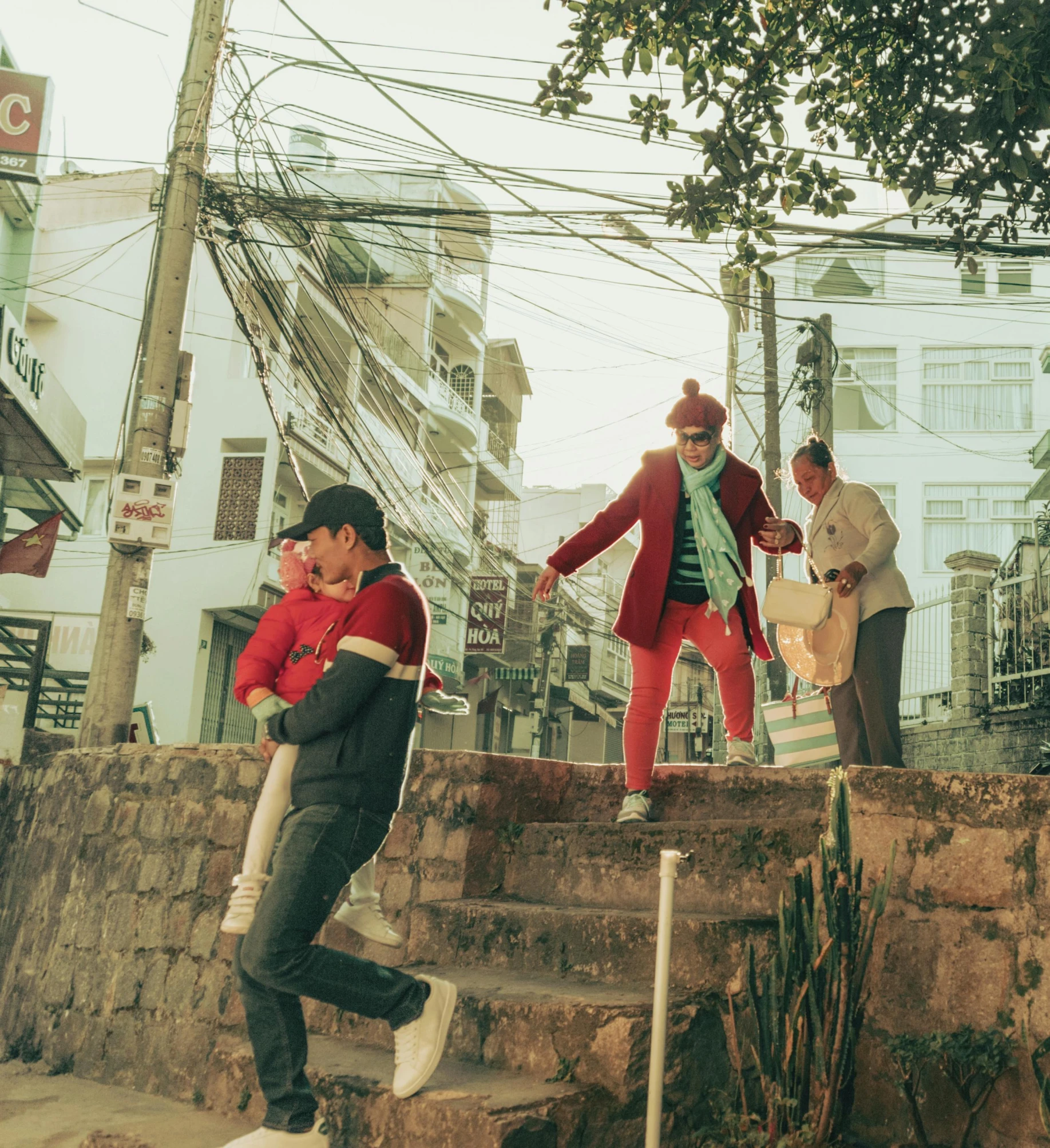 several people riding skateboards on a ledge