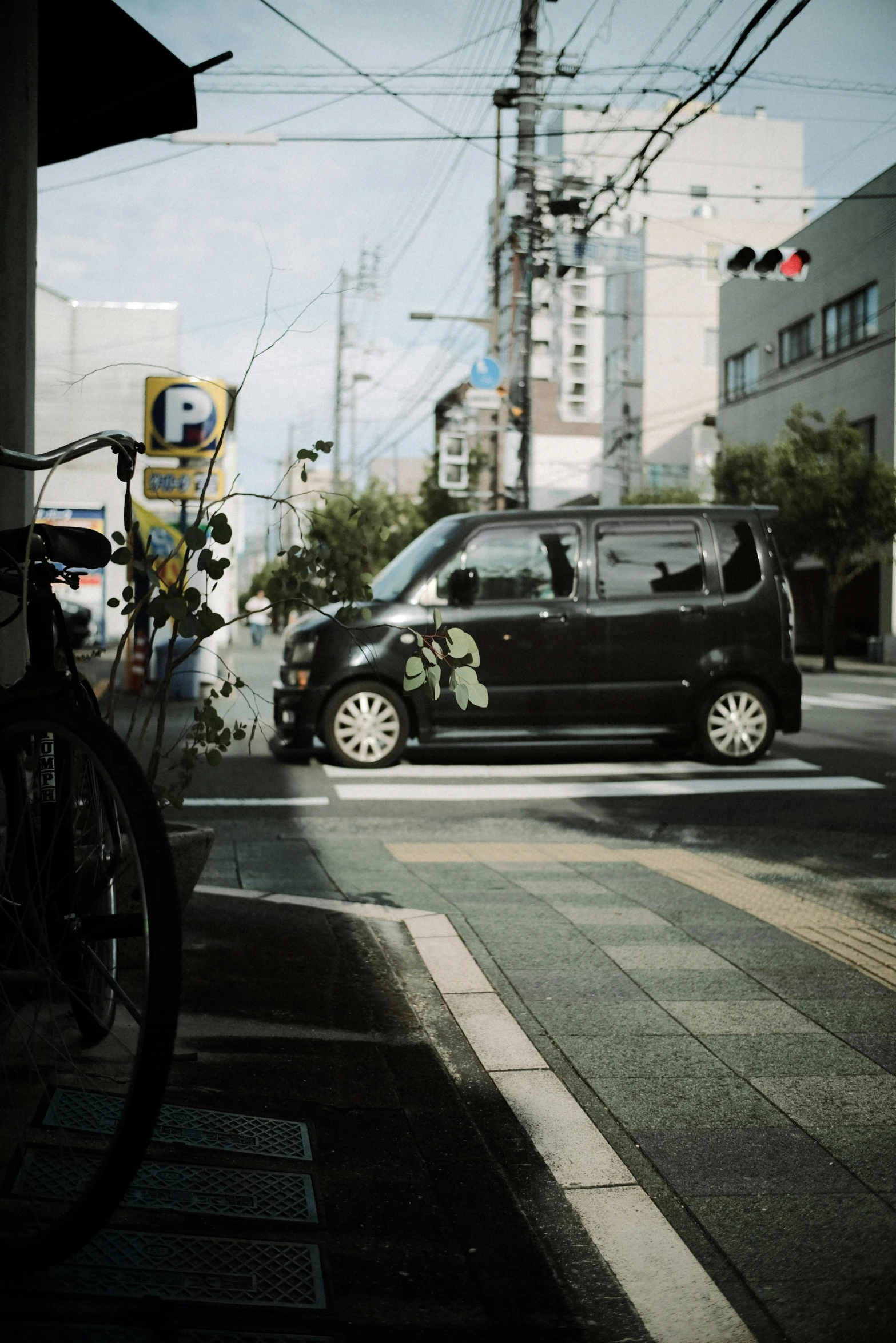 a van is parked on the side of the street