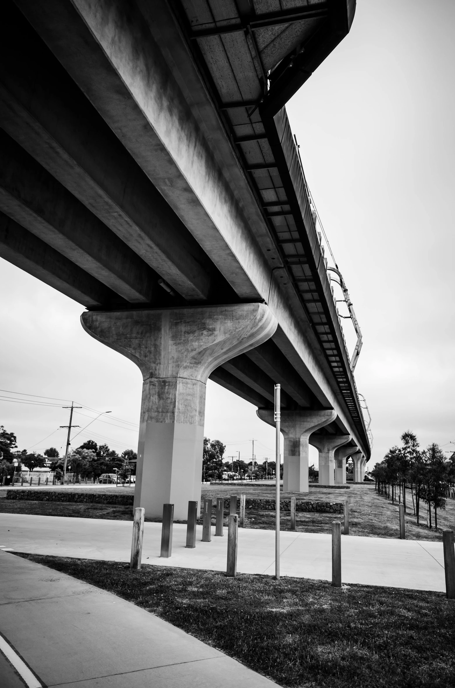 a road under a bridge on an overpass