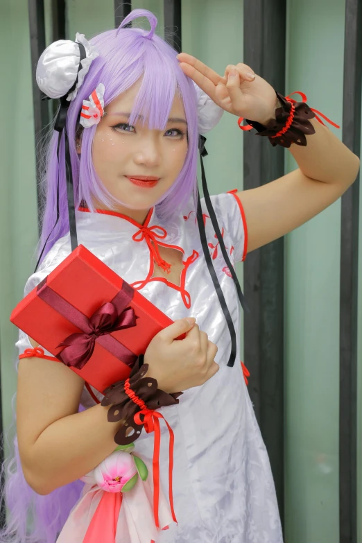 a girl with purple hair is holding an object