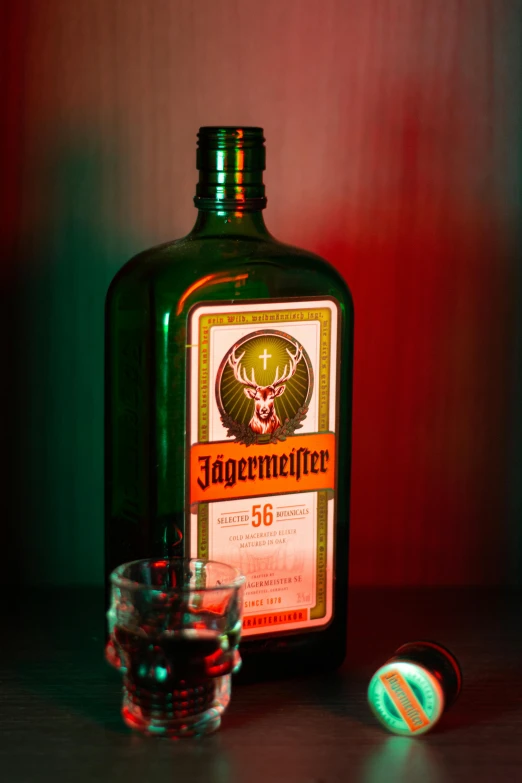 a close - up view of a green bottle of jagermeistere