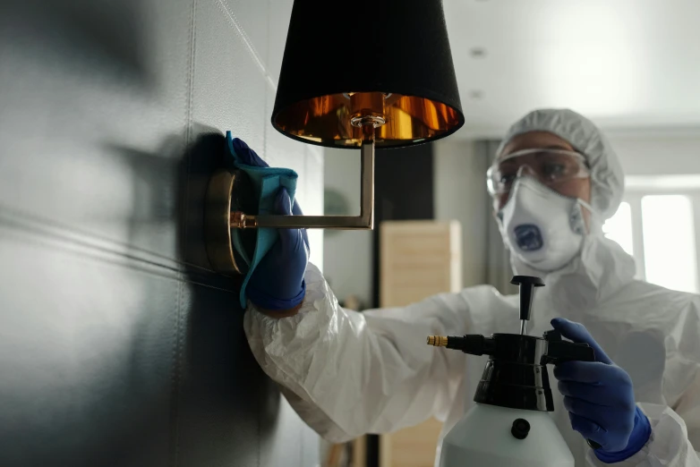 a man wearing protective gear with goggles, safety equipment, and masks