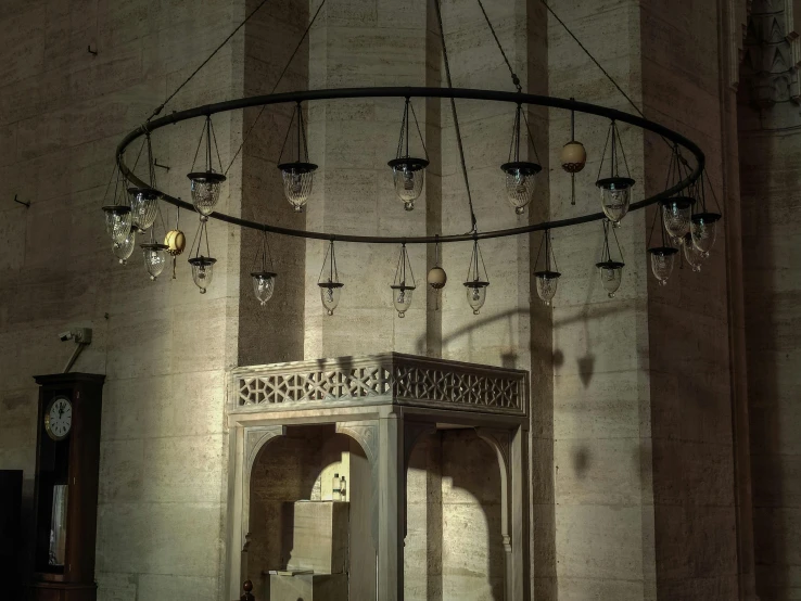 a very ornate room with chandelier hanging from the ceiling