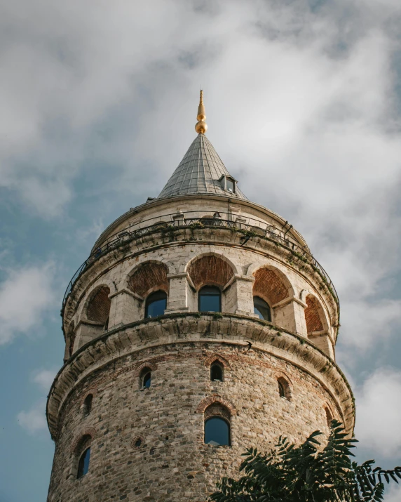 the very tall tower has many windows on each of it