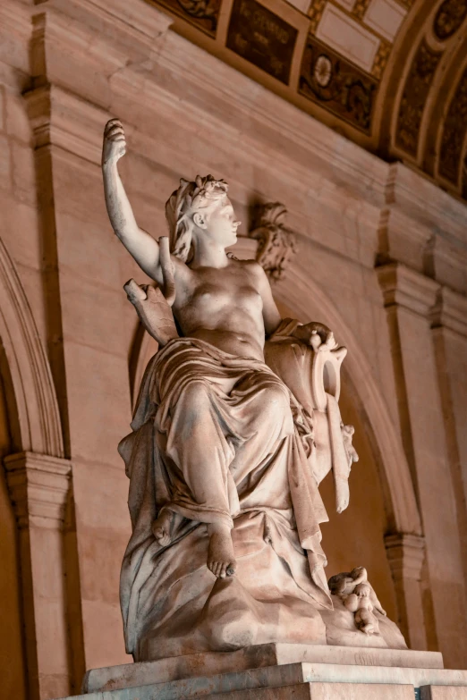 a statue is shown in front of a building