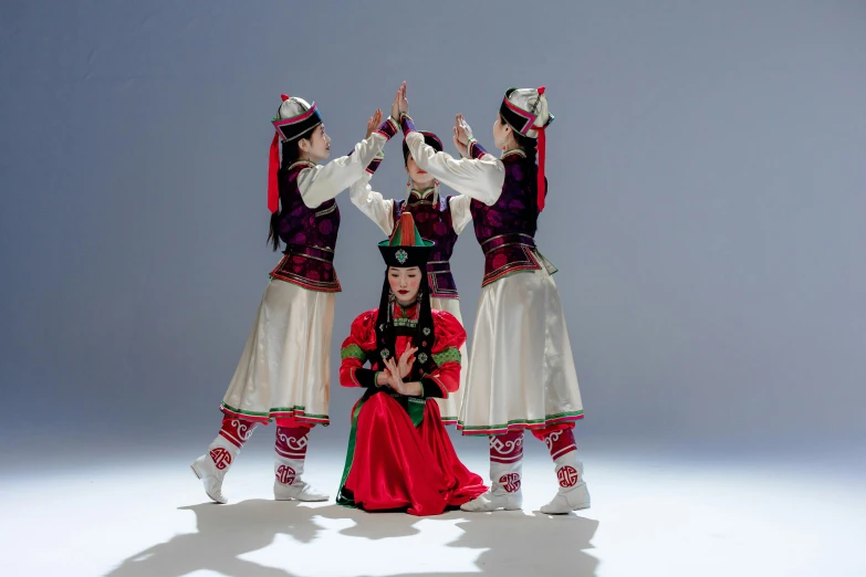 five beautiful women dressed in traditional oriental outfits