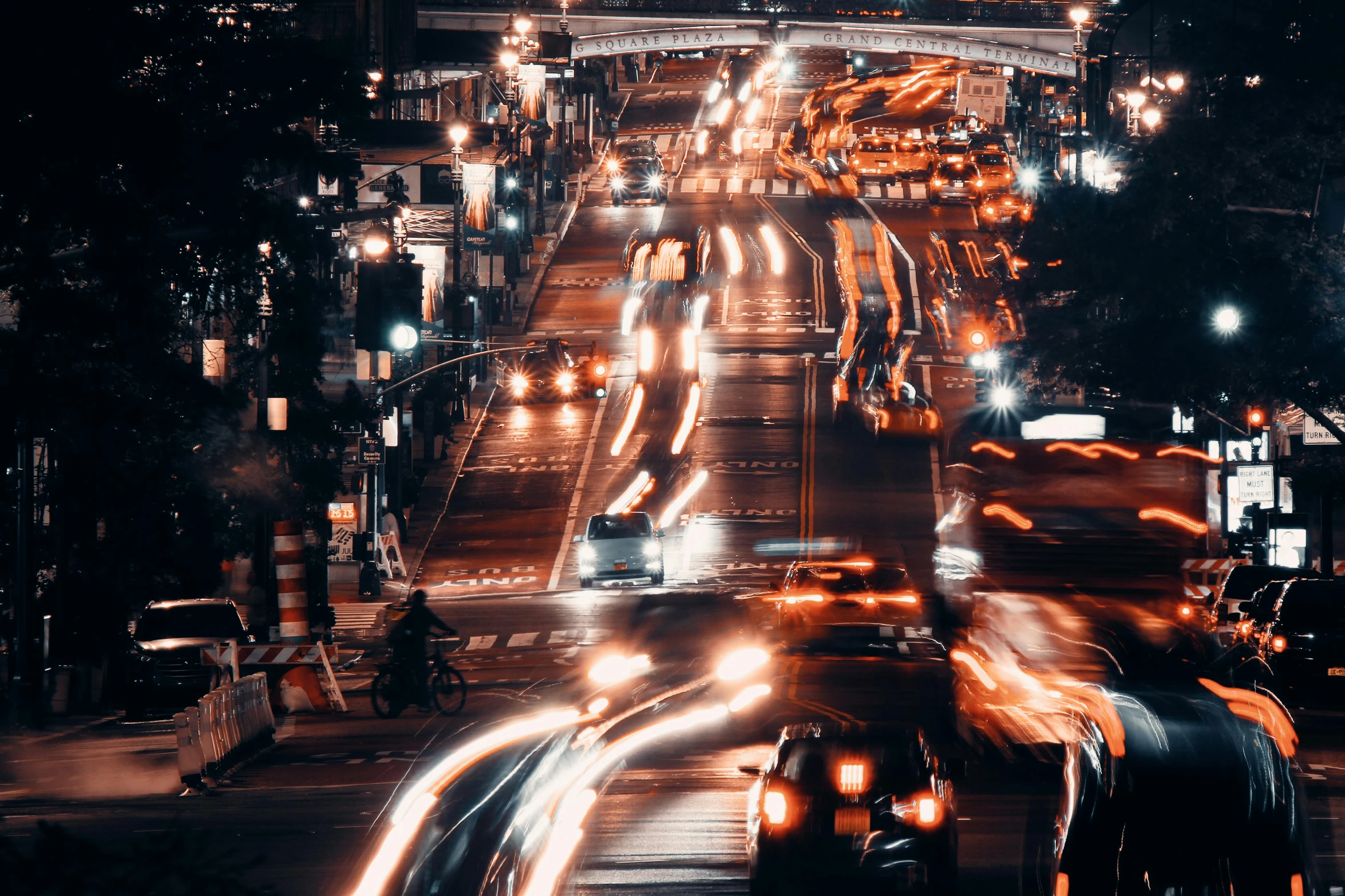 night traffic driving down the freeway on a busy street