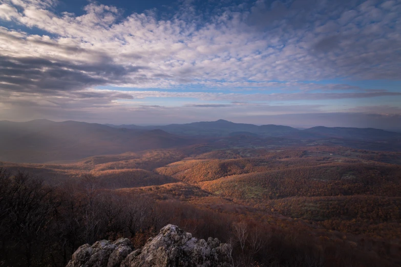 the view from the top of a mountain of a valley