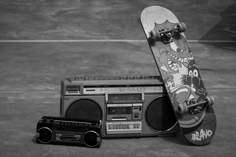 a skateboard, boombox, and boom box are shown