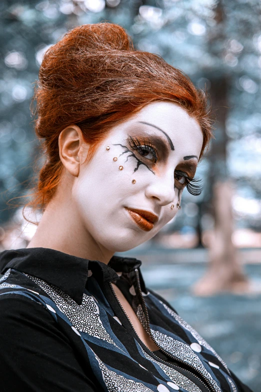 a woman with bright red hair and white makeup