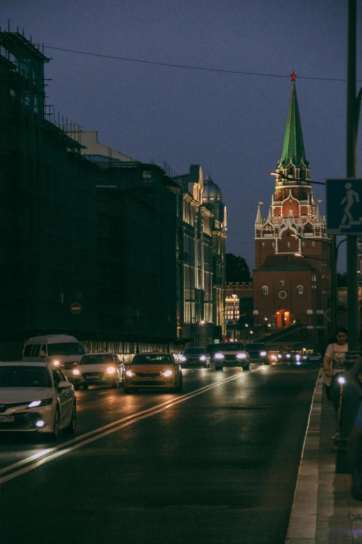 night scene of the moscow international airport with an impressive red and white clock tower