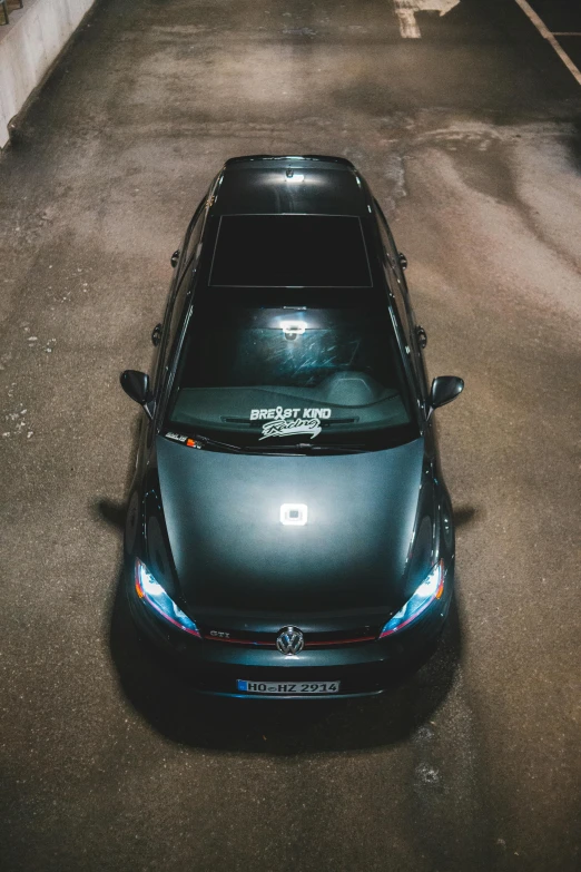 a car is parked inside a parking garage