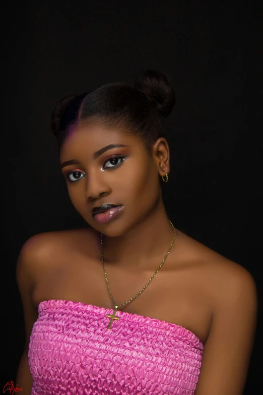 a young woman in a pink tube top