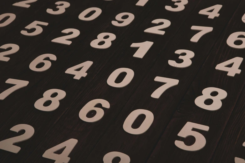 a close up of numbers and letters on a table