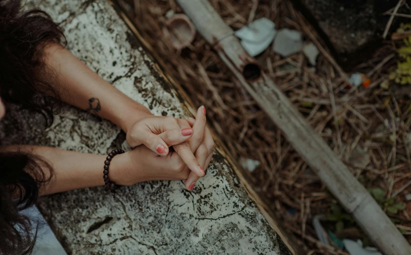 the hands hold together in praying position