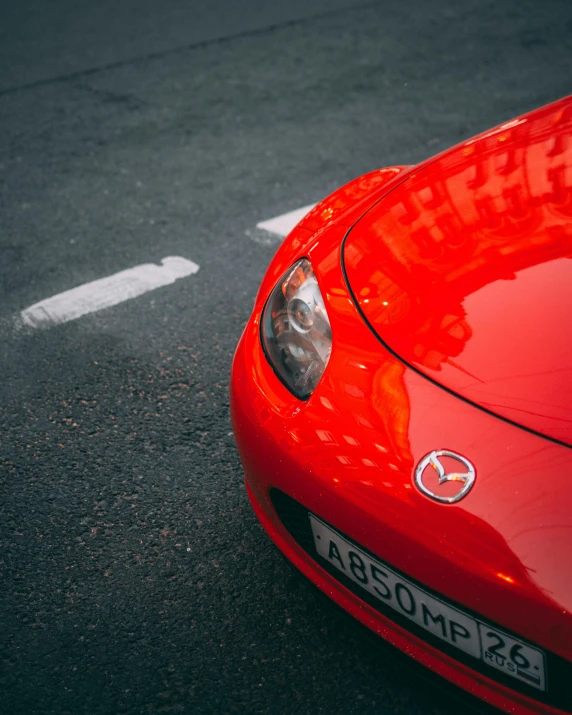 there is an image of a red sports car