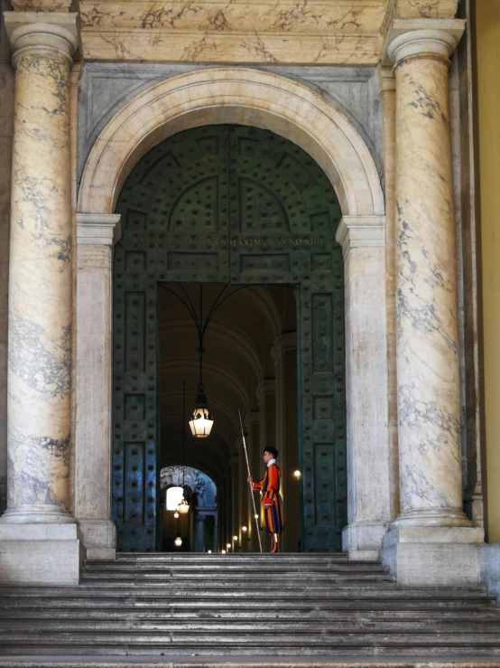 a person standing on some steps at a building