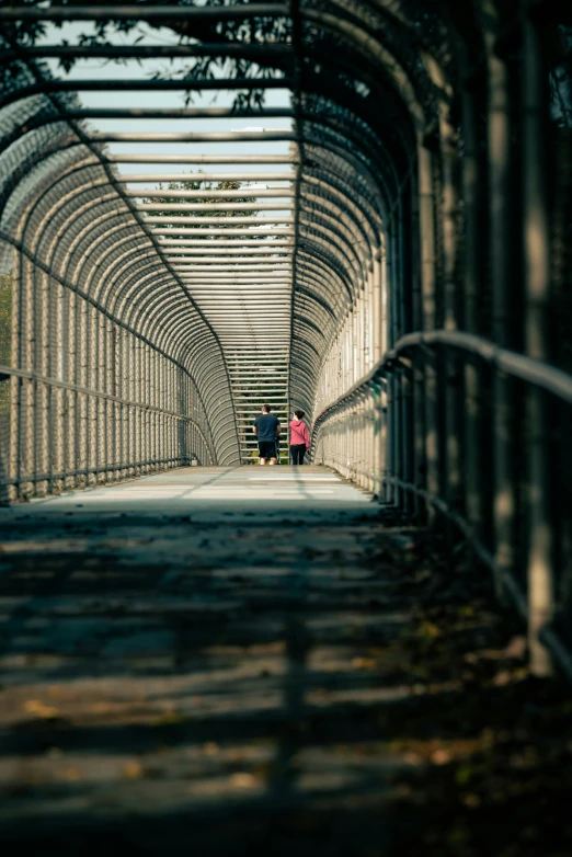 the walkway extends into an entire building made of steel beams