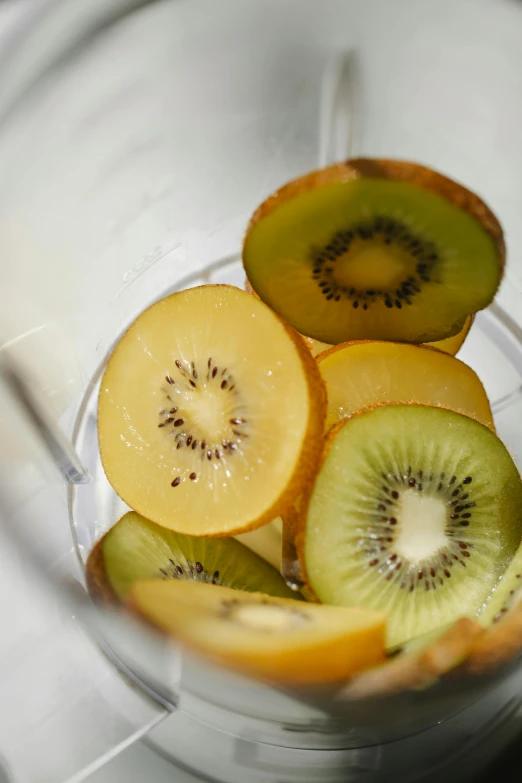 a bowl with fruit sitting on top of it