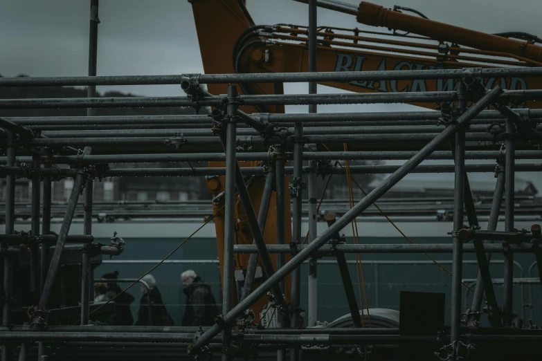 a steel work area with pipes and machinery