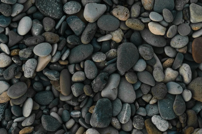 a large group of rocks that look like they are sitting together