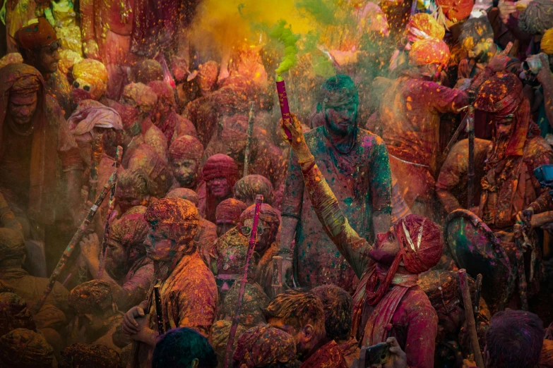 people are celeting a colorful festival while it is holify