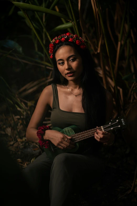 a woman with flower crown and green shirt