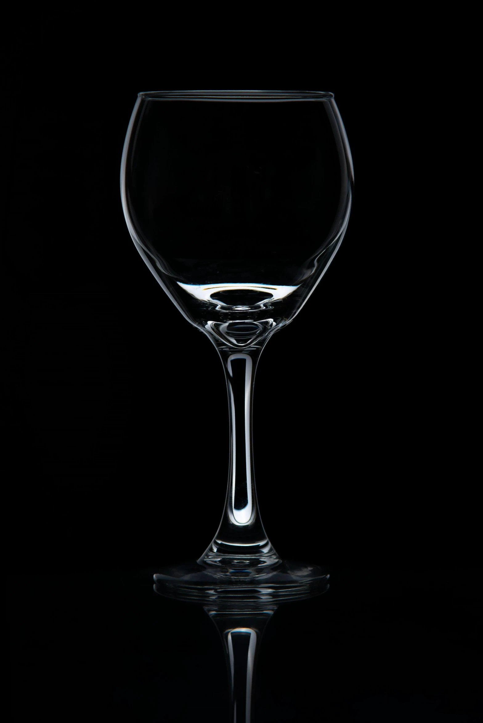 a glass that is on a dark background