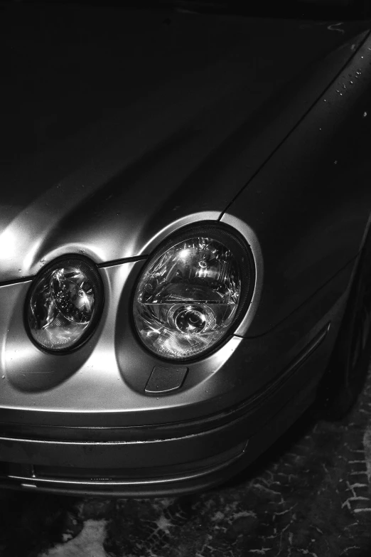 a close up of the headlight of a car