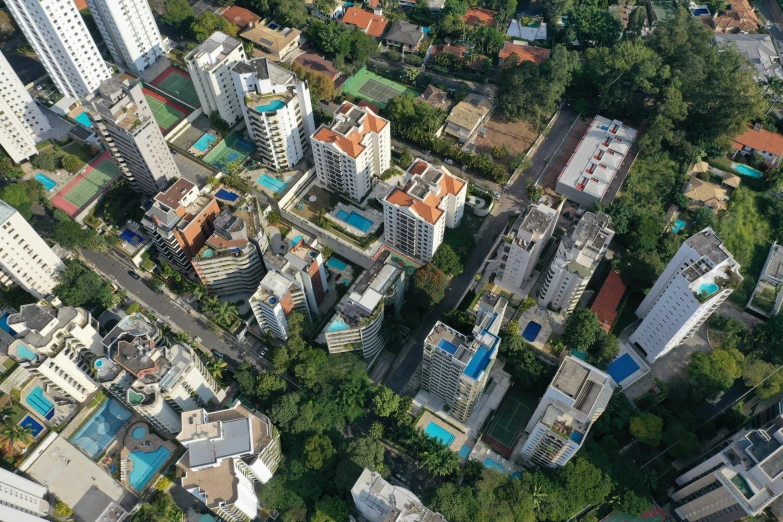 a city with a pool and several different buildings in it