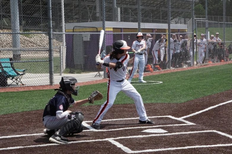 baseball game in progress with a batter up to plate