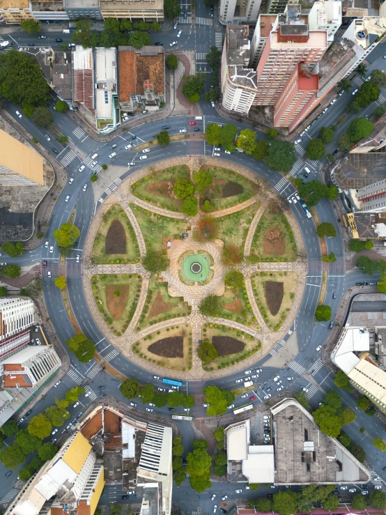 a green circle surrounded by lots of buildings