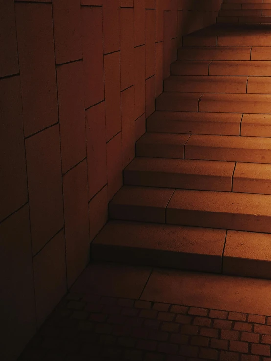 several lights shine on the ground and some stairs