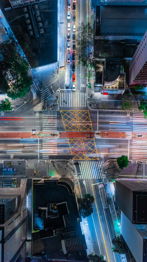 a city street at night with street lights