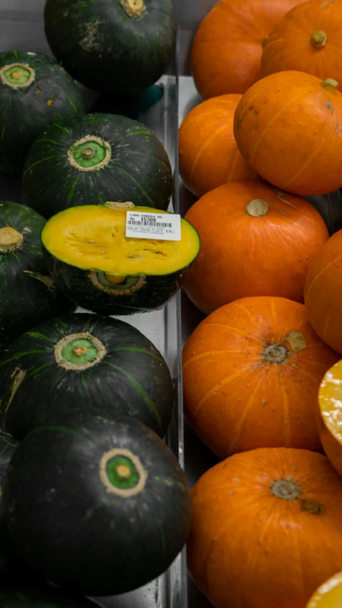 the squash is cut in half and arranged around the whole orange