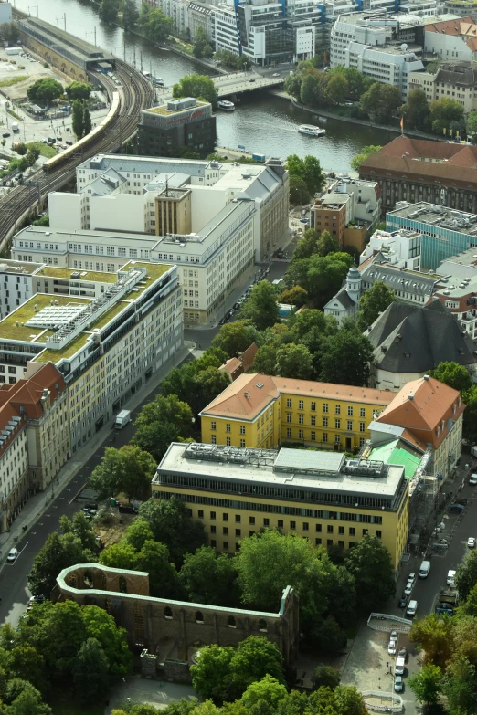 a very aerial view of an urban area and a river