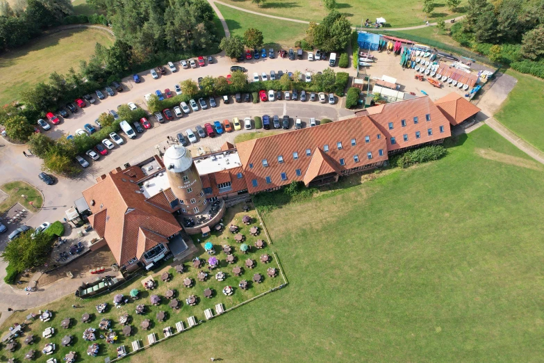 an overhead view of a building in an enclosed park