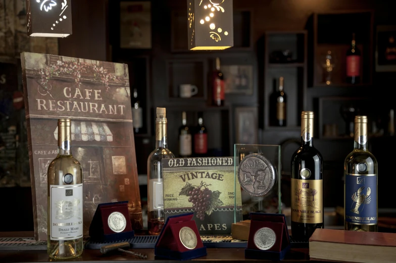 bottles of wine sit on a bar counter