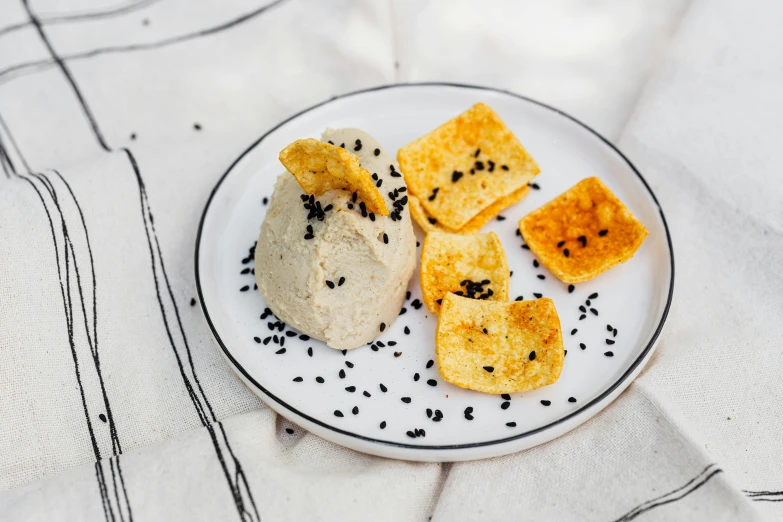 a white plate topped with ers and some cheese