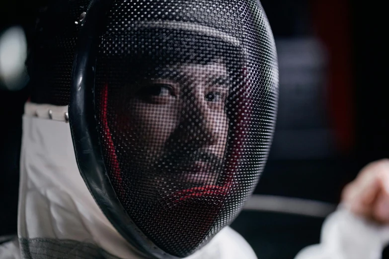 a man in an astronaut suit wearing a head cover