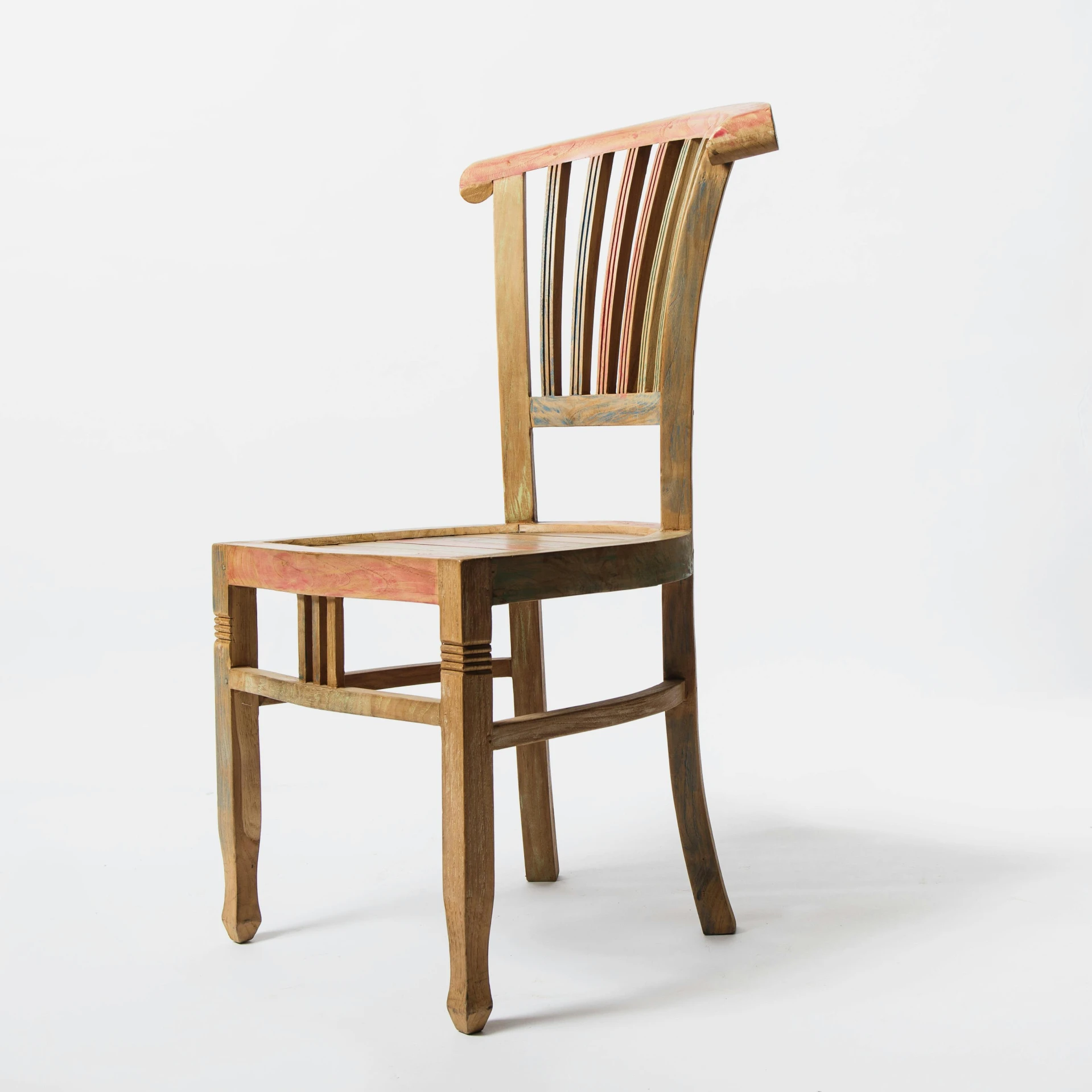 an old wooden chair is sitting against a white background