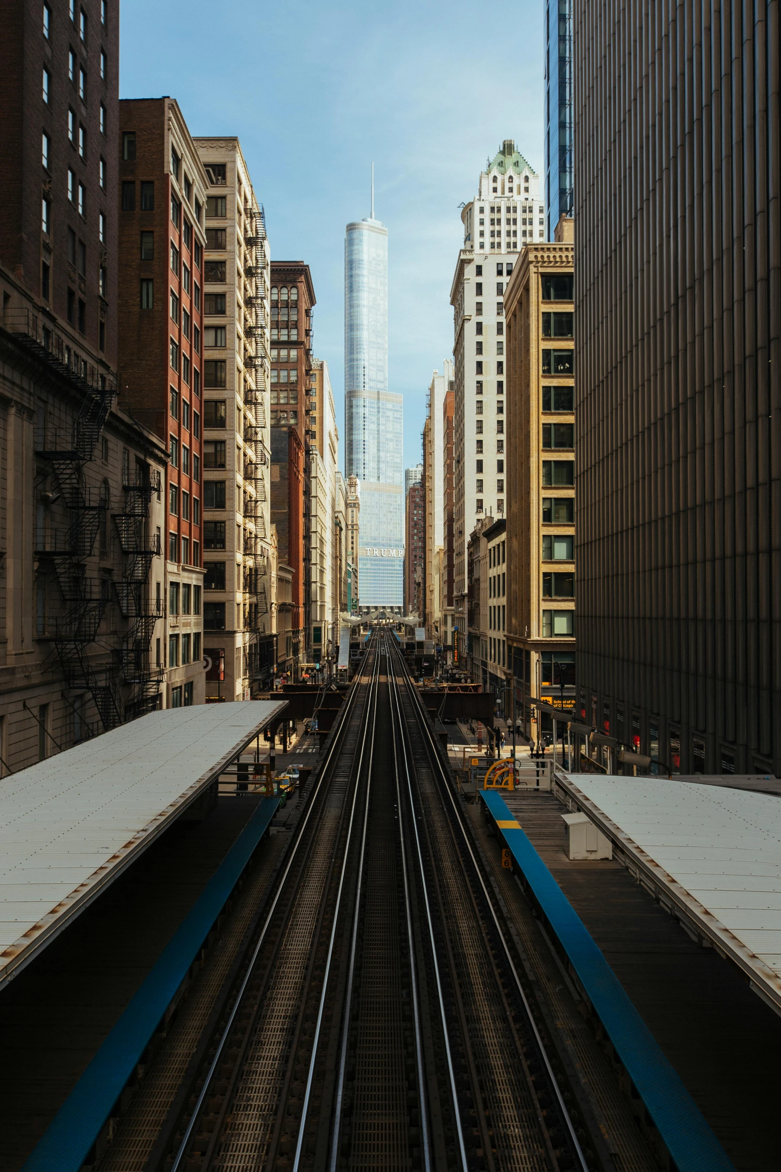 a subway running in the middle of a city