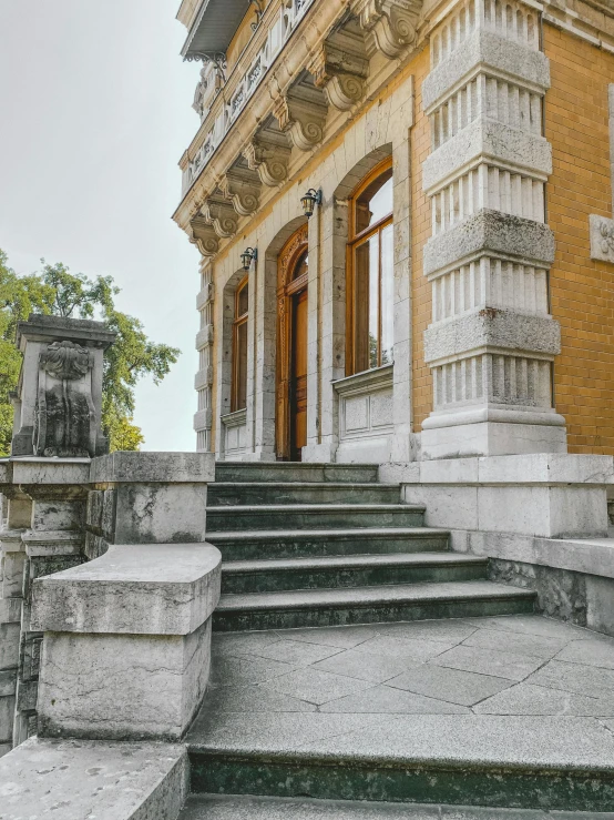 this is an old stone staircase leading up to a building