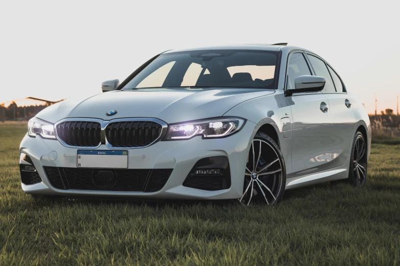 a very well kept car is parked in a field